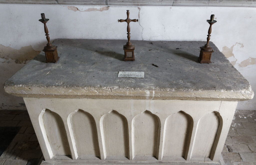 The altar, with a large old stone on the top