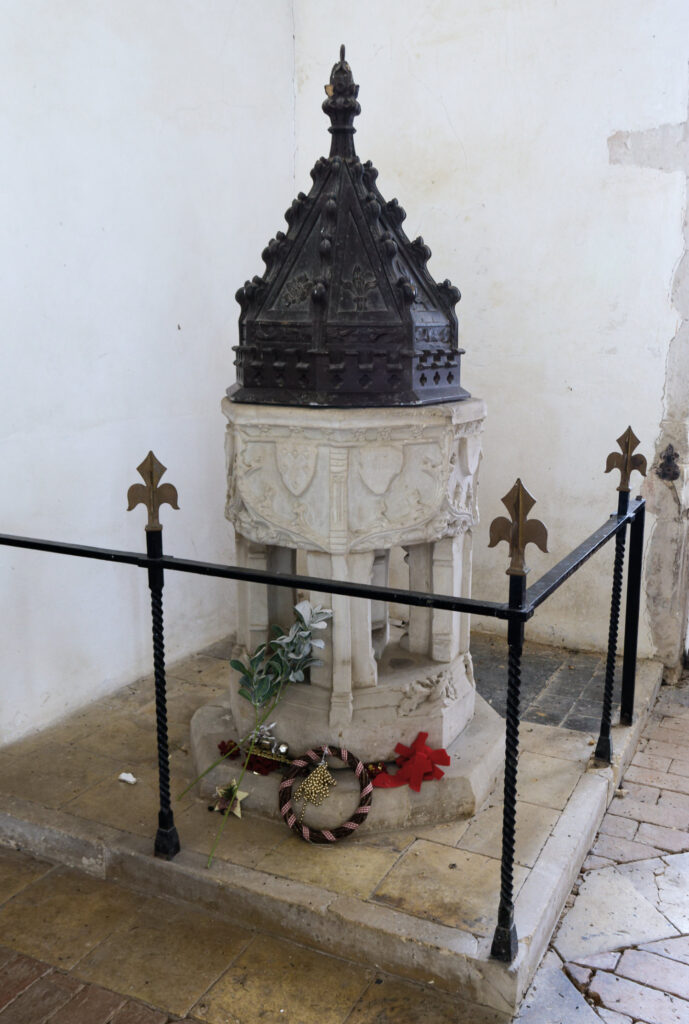 A medieval carved font